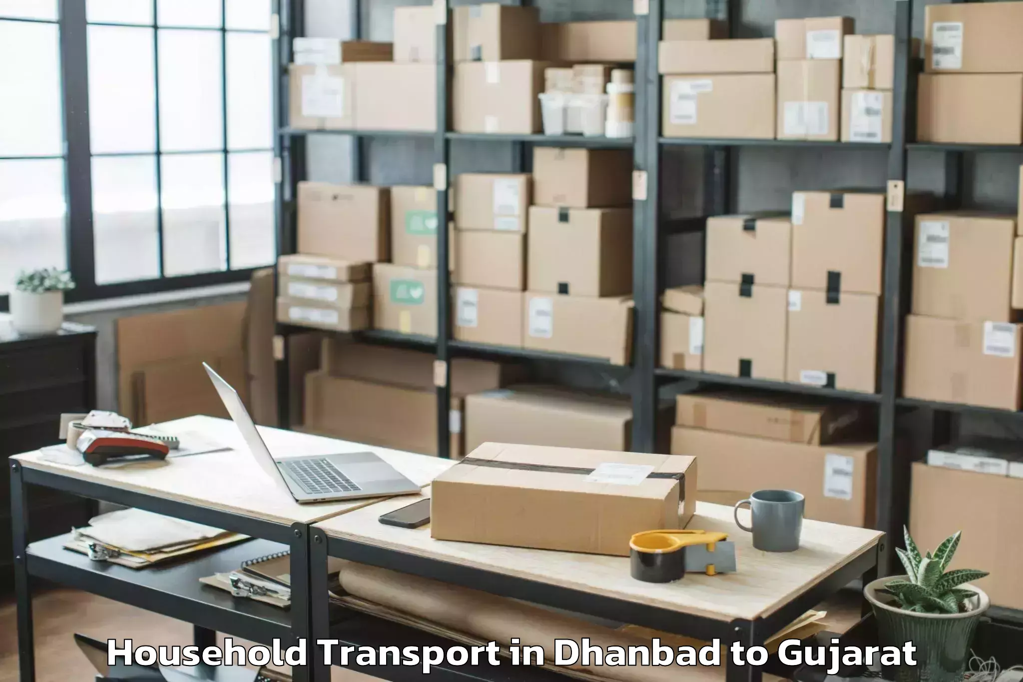 Book Dhanbad to Kadi Household Transport Online